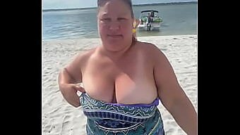 A Slutty Beautiful Wife Flashes Her Big Natural Breasts On A Public Beach